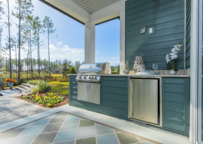 outdoor kitchen with blue siding jacksonville
