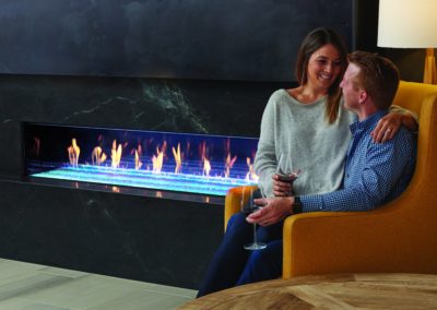 couple enjoying time by a fireplace in jacksonville
