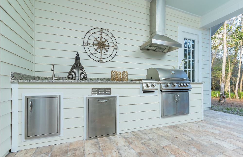 What should you include in your outdoor kitchen?